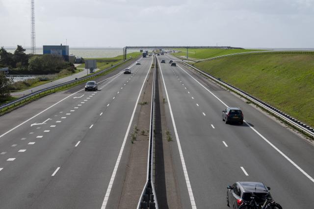 A four lane motorway which looks effectively to be in the middle of the sea with no main land in sight.