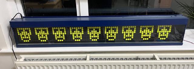 Image of flipdot display showing Cybermen heads